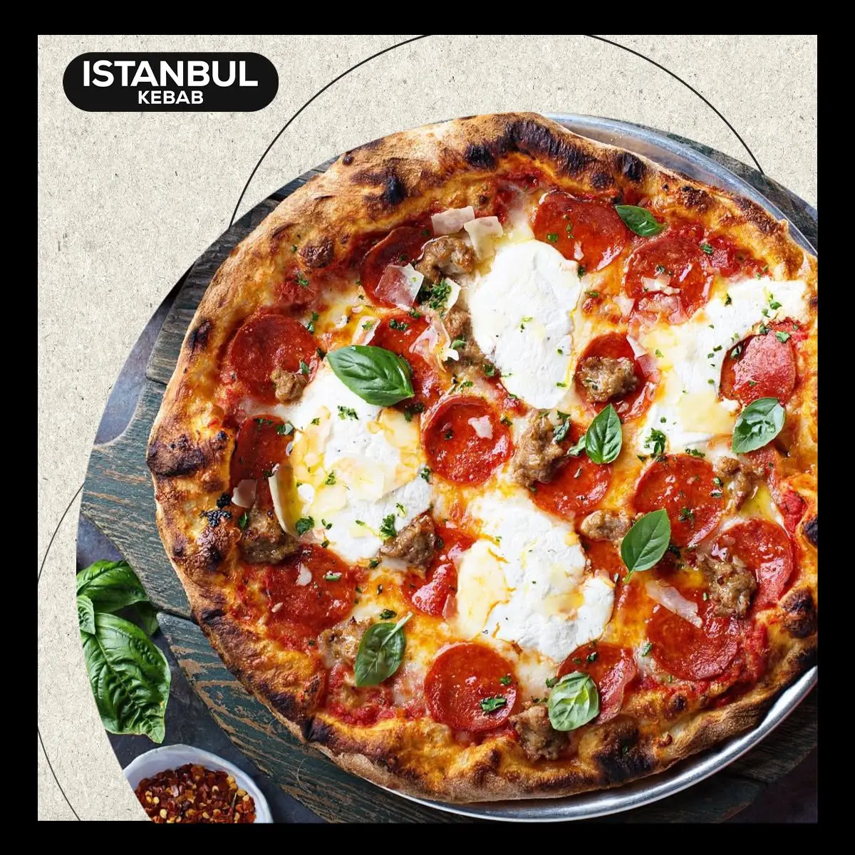 Istanbul Kebab in Wishaw freshly baked pepperoni pizza with cheese and basil leaves.